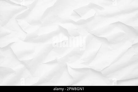 Weißer zerknitterter und abgeschnittener Papierhintergrund. Alte weiße zerknitterte Papierblattstruktur. Papierstruktur, Muster grobe Kunstfaltenbildung Grunge le Stockfoto