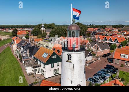 Niederlande, Urk, Leuchtturm des Fischerdorfes, das eine Insel in der Zuiderzee war, bevor es 1939 zum Flevo-Polder wurde. Conser Stockfoto