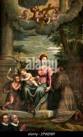 Madonna col Bambino con S. Giovannino, S.. Francesco d’Assisi e Due fedeli - olio su tela - Antonio Gandino - XVII secolo - Gussago (Bs) Santuario dell Stockfoto