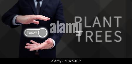 Schreiben mit Text Pflanzen Bäume, Geschäftskonzept Pflanzen eines Baumes für den Landbau und die Forstwirtschaft Stockfoto