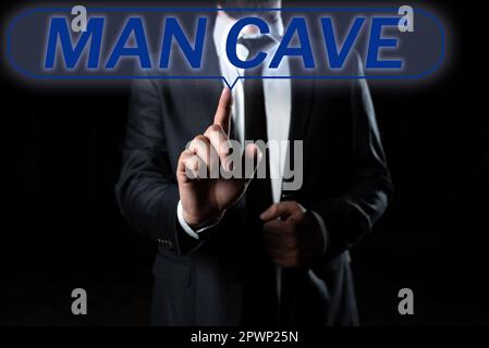 Schild mit der Aufschrift man Cave, Business Concept ein Zimmer, eine Fläche oder ein Bereich einer Wohnung, die für einen Mann reserviert ist Stockfoto