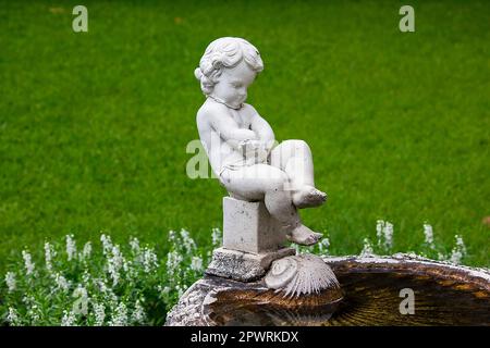 Cupid Fountain im Park Stockfoto