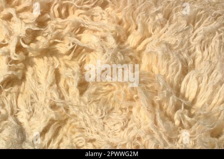 Luxuriöse Wollstruktur aus weißem Schafsleder Stockfoto