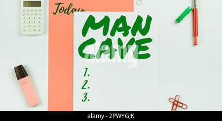 Schrift mit Text man Cave, Word für ein Zimmer, einen Wohnbereich oder einen Wohnbereich, der für einen Mann reserviert ist Stockfoto