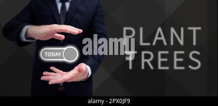 Schreiben mit Text Pflanzen Bäume, Geschäftskonzept Pflanzen eines Baumes für den Landbau und die Forstwirtschaft Stockfoto