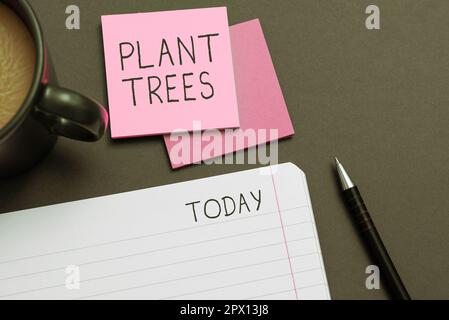Schild mit Pflanzen Bäumen, Geschäftskonzept zum Pflanzen eines Baumes für den Landbau und die Forstwirtschaft Stockfoto