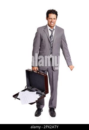 Nicht schon wieder. Eine junge Führungskraft, die alle Dokumente aus dem Aktenkoffer fallen lässt. Stockfoto