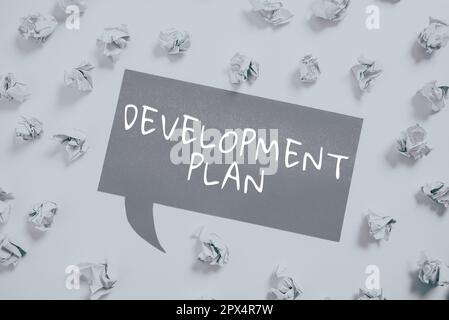 Schreiben mit Text Entwicklungsplan, Business zeigt die Planung der Erschließung eines Landgebiets Stockfoto