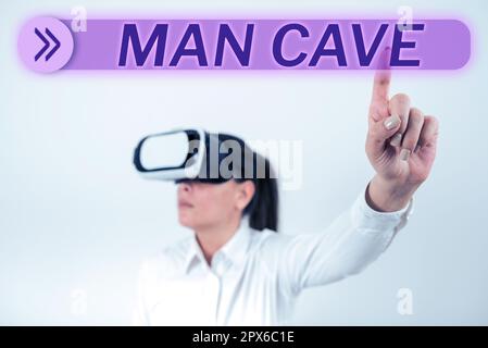 Schild mit der Anzeige man Cave, Geschäftsübersicht ein Zimmer, eine Fläche oder ein Bereich einer Wohnung, die für einen Mann reserviert ist Stockfoto