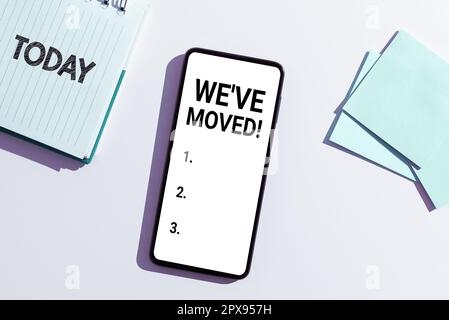 Konzeptausstellung Wir sind umgezogen, Business-Showcase wird von einem anderen Ort aus, das gleiche oder ein anderes Land Stockfoto