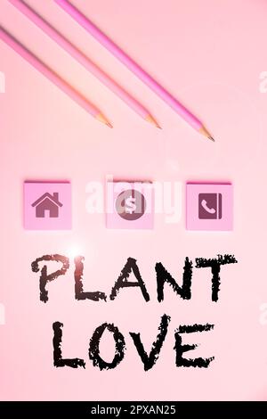 Konzeptionelle Überschrift Plant Love, ein Wort auf einem Symbol für emotionale Liebe, Fürsorge und Unterstützung, das anderen gezeigt wird Stockfoto