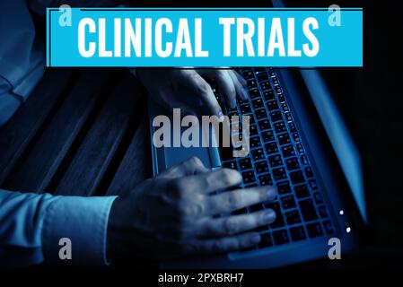 Text zeigt Inspiration Clinical Trials, Business Overview Research Investigation to New Treatments to people Stockfoto