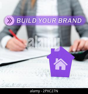 Schreiben Anzeigen von Text Aufbau Ihrer Marke, Geschäftsidee Erstellen Sie eine kommerzielle Identität Marketingwerbung Stockfoto