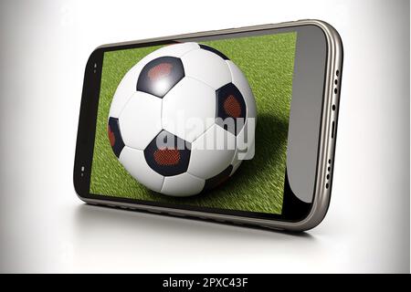 Smartphone mit Fußball. Online-Spiel oder Video-Stream. Stockfoto