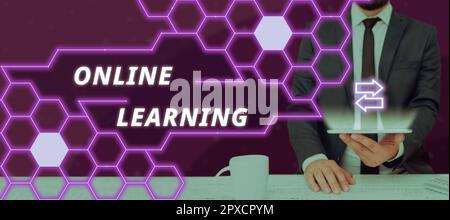 Schild mit Anzeige von Online Learning, Geschäftsübersicht Larning mit Hilfe des Internets und eines Computers Stockfoto
