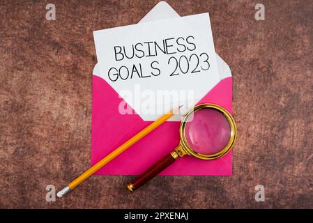 Schild mit Geschäftszielen 2023, Geschäftsidee Erweiterte Funktionen rechtzeitige Erwartungen Ziele Stockfoto