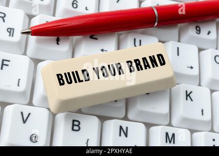 Schreiben Anzeige Text Build Your Brand, Konzept Bedeutung Machen Sie eine kommerzielle Identität Marketing-Werbung Stockfoto