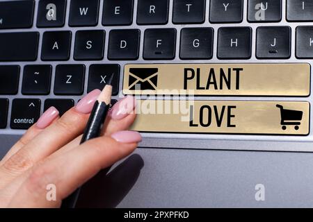 Konzeptionelle Darstellung Plant Love, Wort für ein Symbol emotionaler Liebe, Fürsorge und Unterstützung, das anderen gezeigt wird Stockfoto