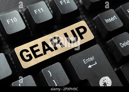 Schreiben mit Text „Gear Up“ (Ausrüstung), „Business Concept“ (Geschäftskonzept), in dem jemand darum bittet, seine Kleidung oder seinen Anzug schnell fertig zu machen Stockfoto