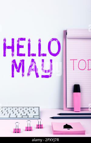 Schild mit der Aufschrift „Hallo Mai, Geschäftskonzept“, um den fünften Monat des Jahres mit Inspiration und Ermutigung anzusprechen Stockfoto