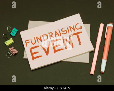 Handgeschriebenes Schild Fundraising Event, Internet-Konzeptkampagne, deren Zweck es ist, Geld für eine Sache zu sammeln Stockfoto