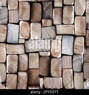 Eine Textur aus Holz. Viele gestapelte Holzleisten von der Vorderseite. Stockfoto