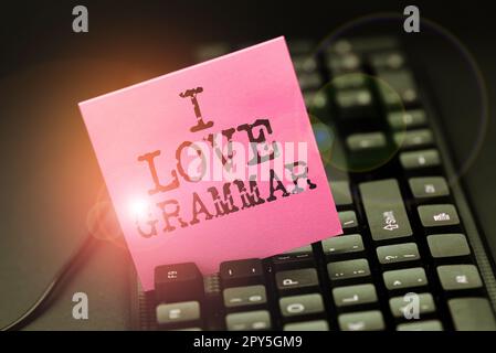 Schreiben mit Text „I Love Grammar“. Geschäftsvorstellung der Bewunderung des Systems und der Sprachstruktur Stockfoto