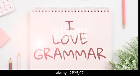 Schreiben mit Text „I Love Grammar“. Ubersichtsarbeit über Bewunderungssystem und Sprachstruktur Stockfoto