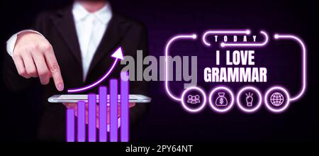 Schreiben mit Text „I Love Grammar“. Internetbegriffshandlung des Bewunderungssystems und der Sprachstruktur Stockfoto