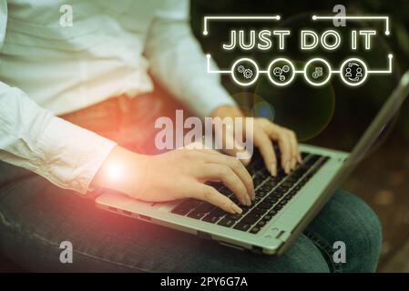 Schild mit der Anzeige Just Do IT. Geschäftsansatz Motivation, etwas zu tun, hat Disziplin Stockfoto