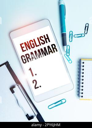 Inspiration mit Zeichen für englische Grammatik. Die Kurse zum Geschäftsansatz decken alle Ebenen der englischen Sprache und des Schreibens ab Stockfoto