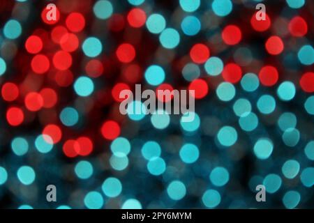 Blaue und rote abstrakte Bokeh-Unschärfe-Lichter Stockfoto