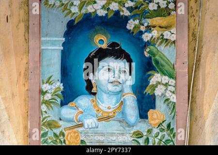 06 12 2017 Vintage Lord Bal Krishna gemalt auf Shope Schild Sangli Town Maharashtra India. Stockfoto