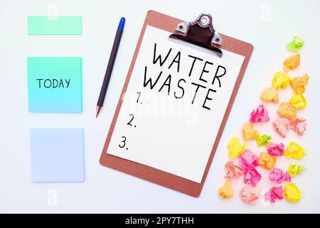 Schriftstück mit Text Wasserverschwendung. Konzeptionelle Fotoflüssigkeit, die als Teil eines industriellen Prozesses verwendet wird Stockfoto