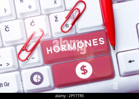 Inspiration zeigt Zeichen-Hormone. Wort über regulatorische Substanzen, die in Organismus transportierten Gewebeflüssigkeiten produziert werden Stockfoto