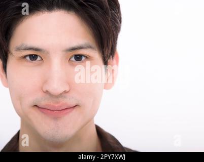 Gut aussehender junger Mann mit gesundem Gesicht Stockfoto