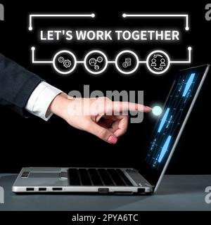 Schild mit der Aufschrift Let's Work Together. Konzept bedeutet: Vereinigen und vereinigen Sie Ihre Kräfte, um ein gemeinsames Ziel zu erreichen Stockfoto