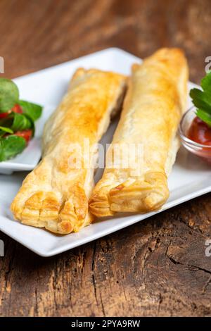 frankfurter in Blätterteig Stockfoto