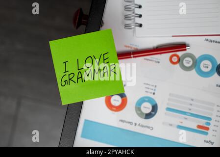 Schreiben mit Text „I Love Grammar“. Geschäftsvorstellung der Bewunderung des Systems und der Sprachstruktur Stockfoto