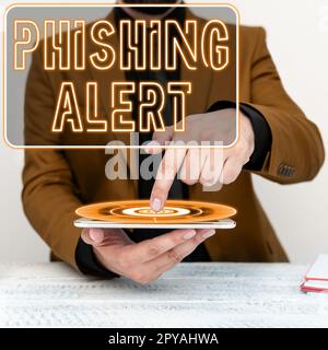 Handgeschriebenes Schild Phishing Alert. Geschäftskonzept, das sich des betrügerischen Versuchs bewusst ist, an vertrauliche Informationen zu gelangen Stockfoto