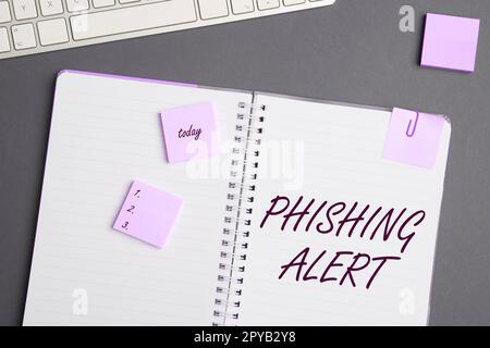 Text mit Inspirations-Phishing-Alarm. Ein Wort, das in Kenntnis des betrügerischen Versuchs, an vertrauliche Informationen zu gelangen, geschrieben wurde Stockfoto