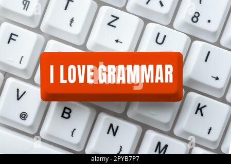Schreiben mit Text „I Love Grammar“. Internetbegriffshandlung des Bewunderungssystems und der Sprachstruktur Stockfoto