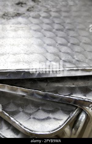 Nasse Metalltische Stockfoto