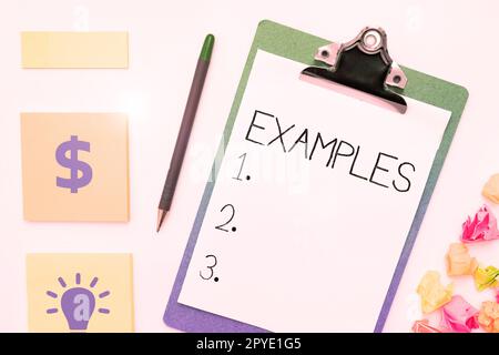 Text mit Beispielen für Inspiration. Ein Wort, das auf dem Beispielmodell mit Foto geschrieben wurde, um beispielsweise der Erklärung des Leitfadens zu folgen Stockfoto