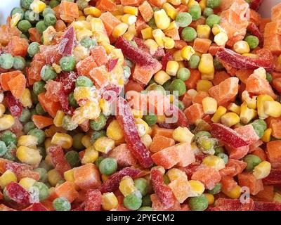 Mexikanische Gemüsemischung. Pfeffer, Karotten, Mais und Erbsen. Eine bunte Mischung aus dem frischesten und heißesten Gemüse Stockfoto