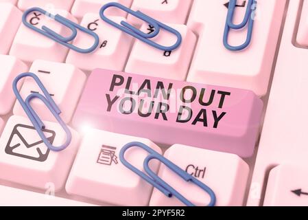 Schreiben mit Text Plan Out Your Day. Wort für: Erstellen Sie einen Zeitplan für die Aktivitäten, die Sie täglich ausführen. Organisieren Sie sich Stockfoto
