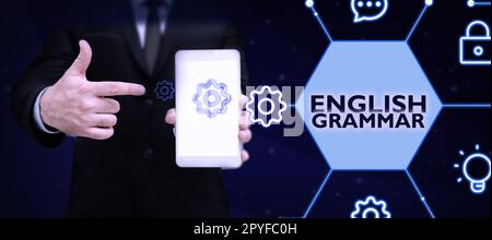 Inspiration mit Zeichen für englische Grammatik. Business Showcase-Kurse decken alle Ebenen der englischen Sprache und des Schreibens ab Stockfoto