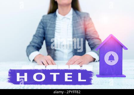 Handgeschriebenes Schild Hotel. Unternehmensübersicht Einrichtung, die Unterbringung und Verpflegung von Reisenden anbietet Stockfoto