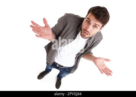 Ich war es nicht. Ein Foto eines jungen Mannes im Studio, der seine Hände hochhält und unschuldig aussieht. Stockfoto