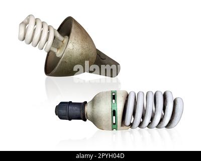 Alte Technologie und vergeudete Elektrizität, durchgebrannte Glühbirne Stockfoto